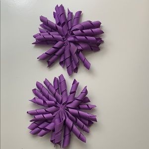 Two purple hair accessories